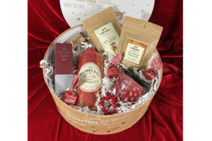 zestaw świąteczny w eleganckim okrągłym pudełku, czekolada, praliny, alkohol, ozdoby świąteczne